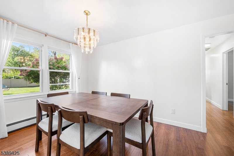 333 Old Tote Road Mountainside, NJ 07092 - Photo 10 of 48 a view of a dining room with furniture window and outside view