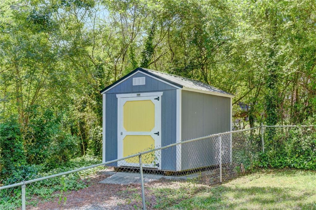 1656 Arrow Wood Road Asheboro, NC 27205 - Photo 22 of 32 Storage building for yard supplies!