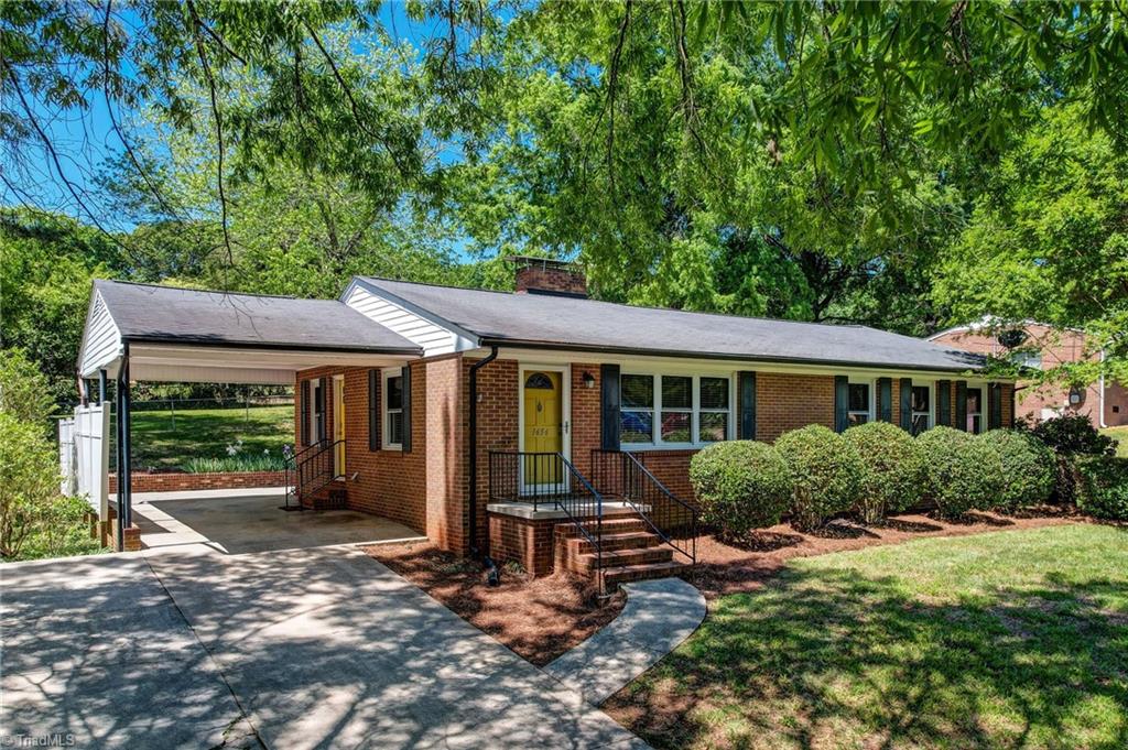1656 Arrow Wood Road Asheboro, NC 27205 - Photo 26 of 32 Attached carport and covered patio, as well as, side entry door!
