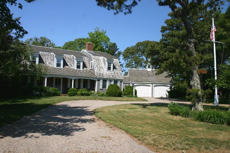 26 Old Salt Works Road Chatham, MA 02633 - Photo 1 of 30 a front view of a house with a yard