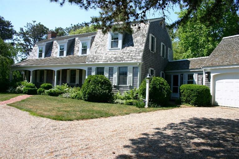 26 Old Salt Works Road Chatham, MA 02633 - Photo 3 of 30 a front view of a house with a garden