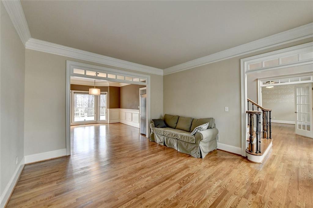 7830 Tintern Trace Duluth, GA 30097 - Photo 14 of 91 a living room with furniture and a wooden floor