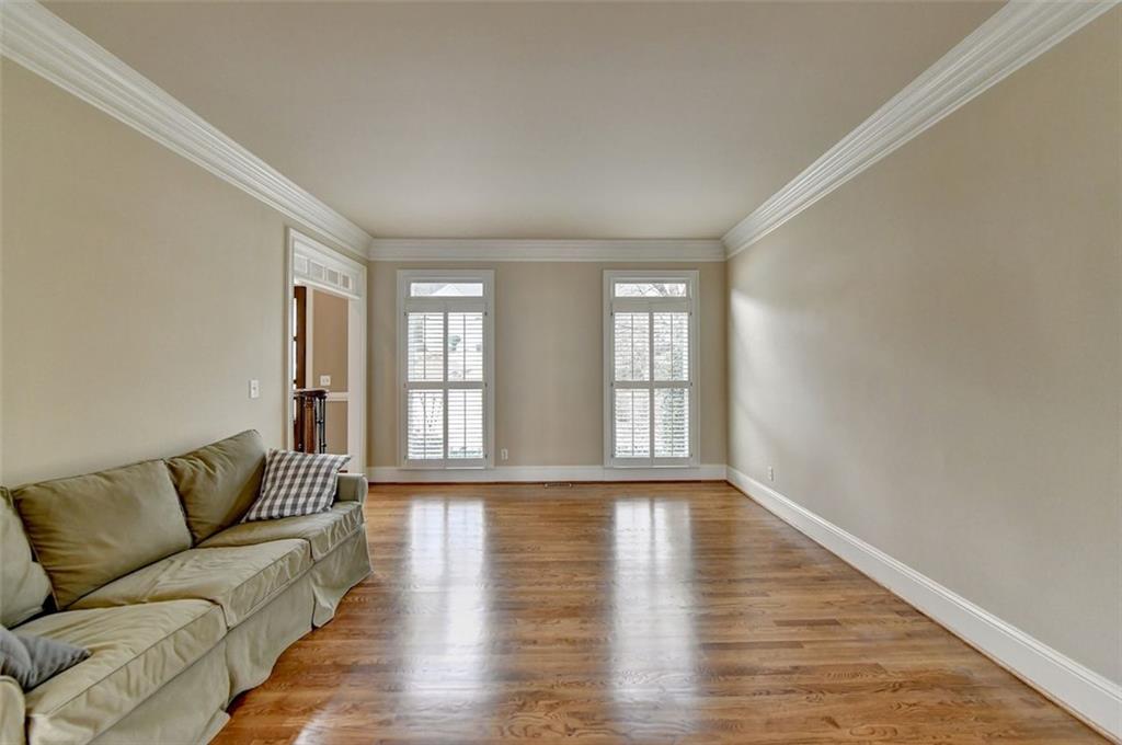 7830 Tintern Trace Duluth, GA 30097 - Photo 15 of 91 a living room with furniture and a large window