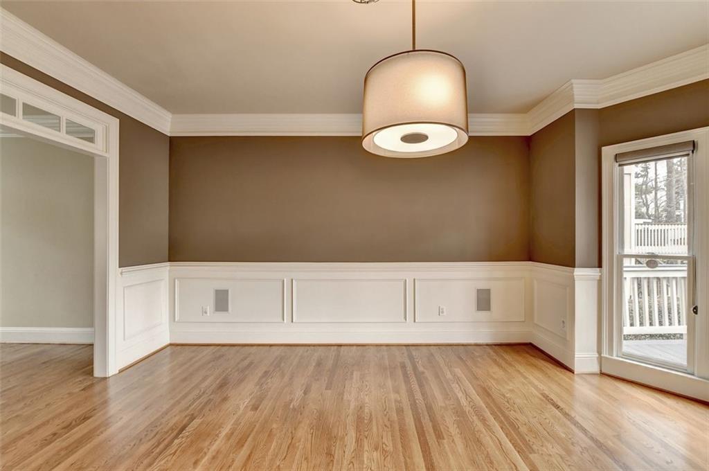 7830 Tintern Trace Duluth, GA 30097 - Photo 18 of 91 an empty room with wooden floor and windows