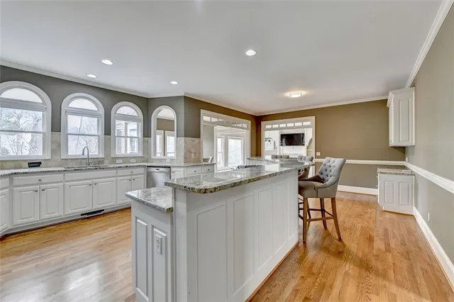 a dining room with furniture window wooden floor
