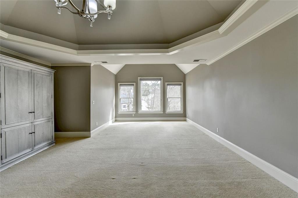 7830 Tintern Trace Duluth, GA 30097 - Photo 44 of 91 a view of an empty room with a window