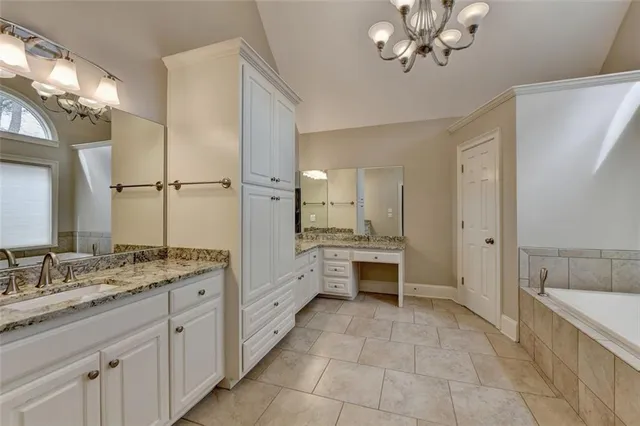 a front view of a building with a yard