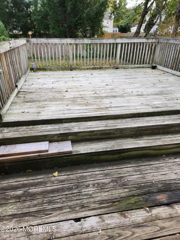 a view of a wooden fence