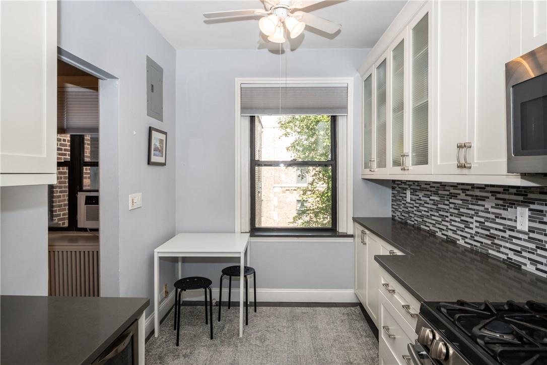Windowed kitchen with dining area