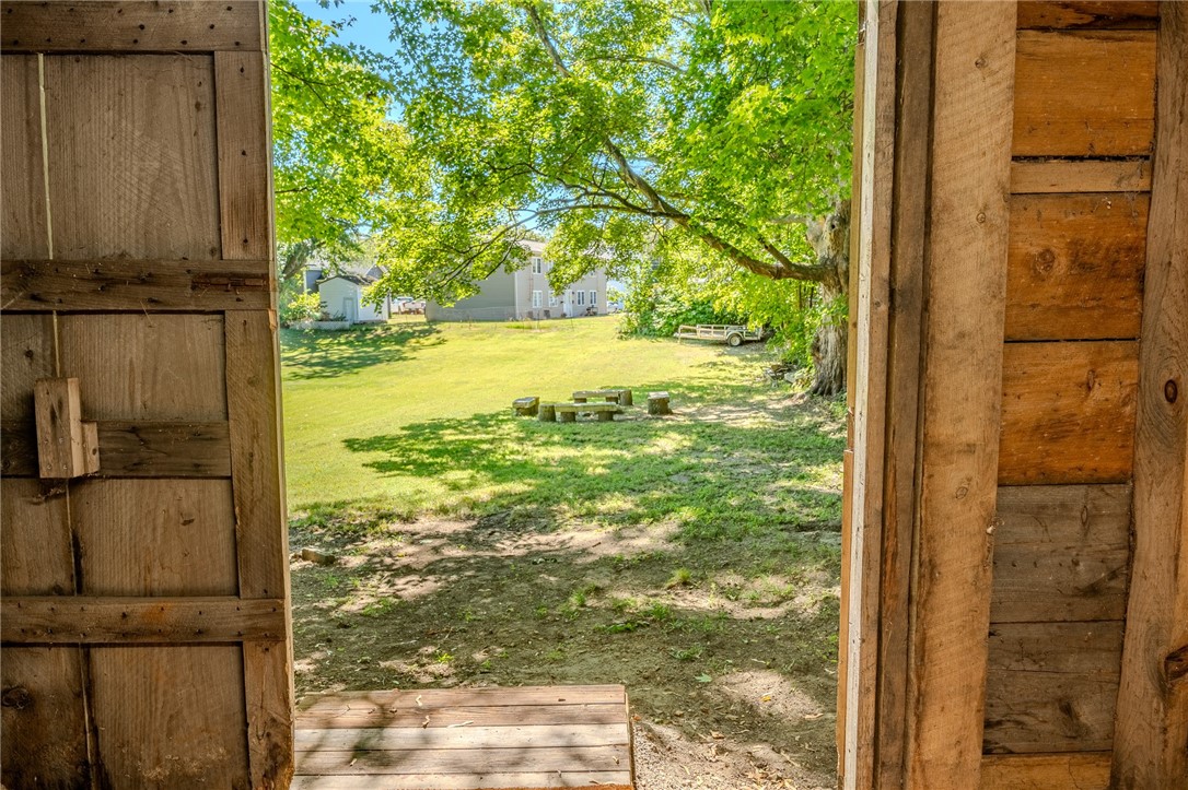 726 Washington Street Coventry, RI 02816 - Photo 43 of 45 View of lower yard from back of outbuilding/barn