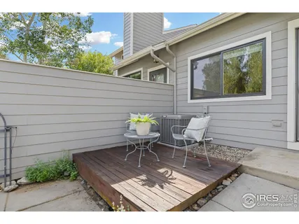 a view of a outdoor with a chairs and table in the patio