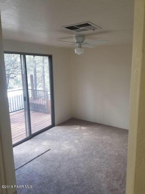 1520 White Spar Road Prescott, AZ 86303 - Photo 13 of 20 a view of an empty room with a window