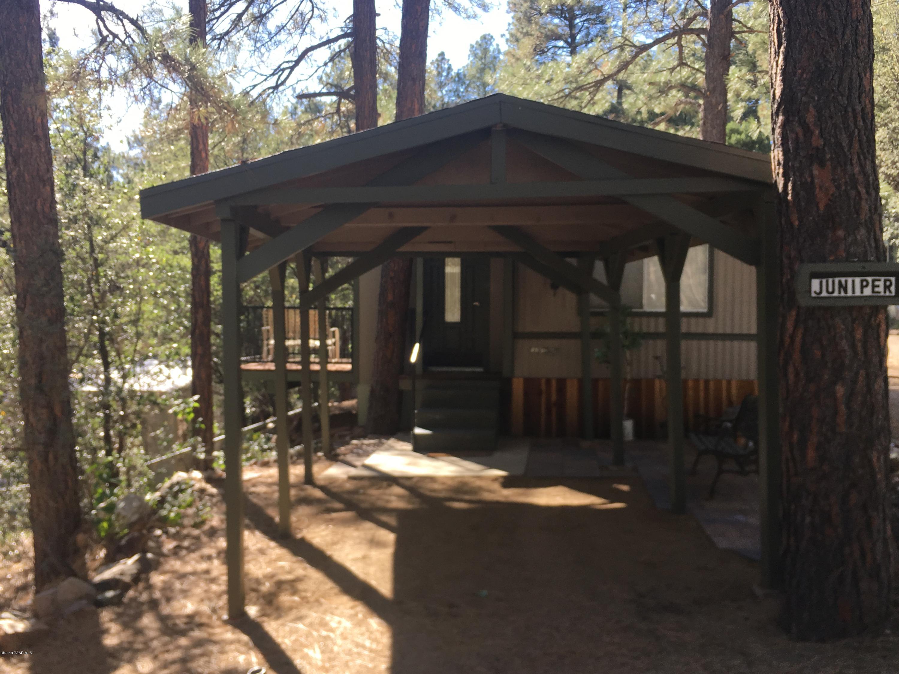 1520 White Spar Road Prescott, AZ 86303 - Photo 2 of 20 a front view of a house with a yard