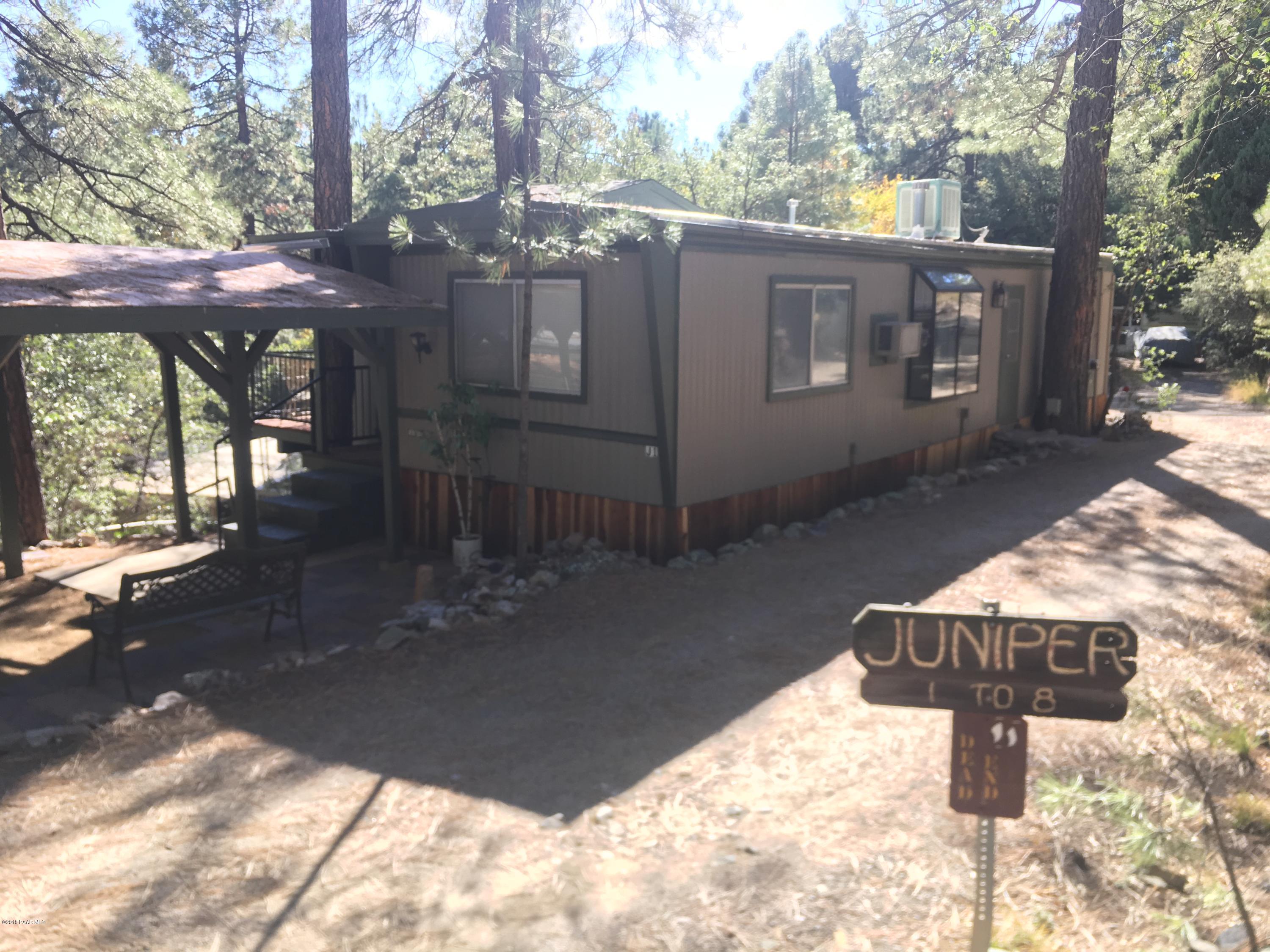 1520 White Spar Road Prescott, AZ 86303 - Photo 6 of 20 a view of a house with wooden fence