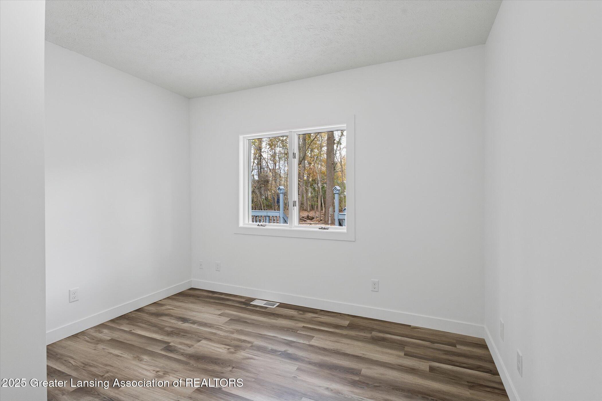 9595 East State Road Haslett, MI 48840 - Photo 21 of 47 20-9595-State-Rd-WindowStill-Photography