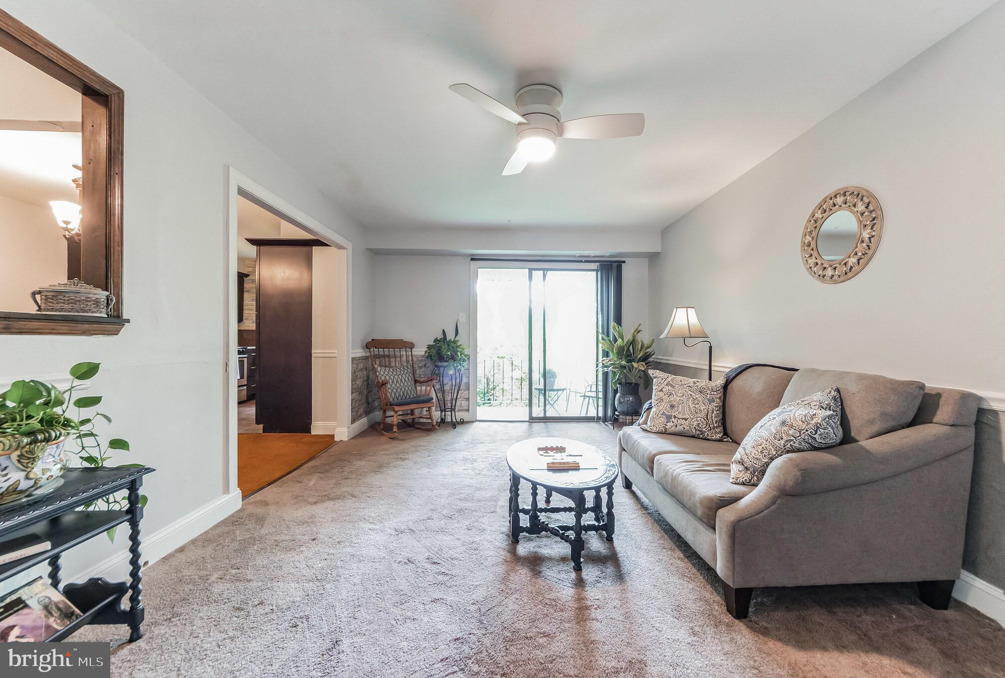 1155 York Rd., Unit J10 Warminster, PA 18974 - Photo 3 of 20 Living room towards slider