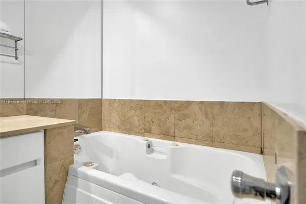 a bathroom with a bathtub