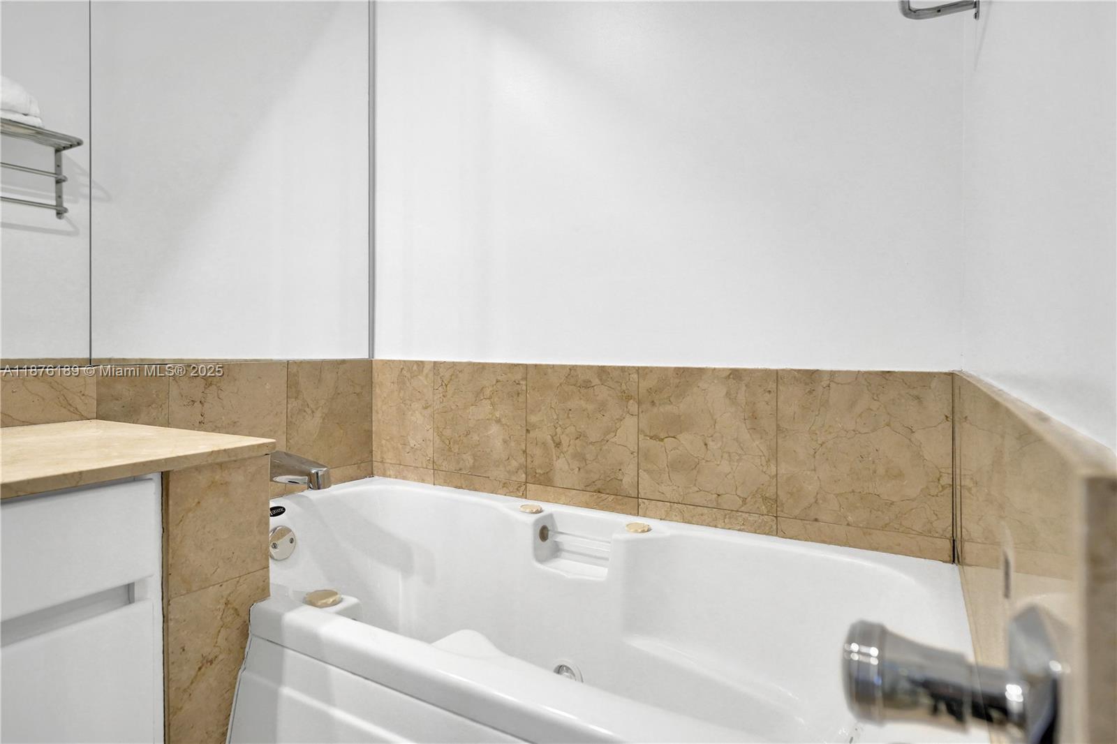 808 Brickell Key Drive, Unit 2506 Miami, FL 33131 - Photo 18 of 30 a bathroom with a bathtub