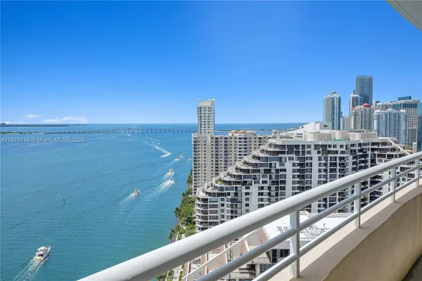a view of a city skyline from a balcony