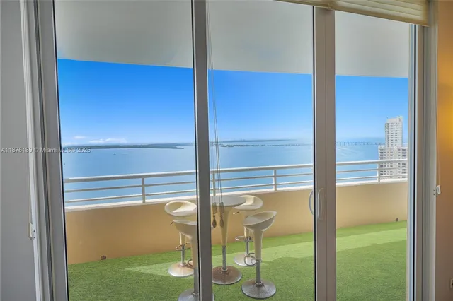 a bathroom with a glass door