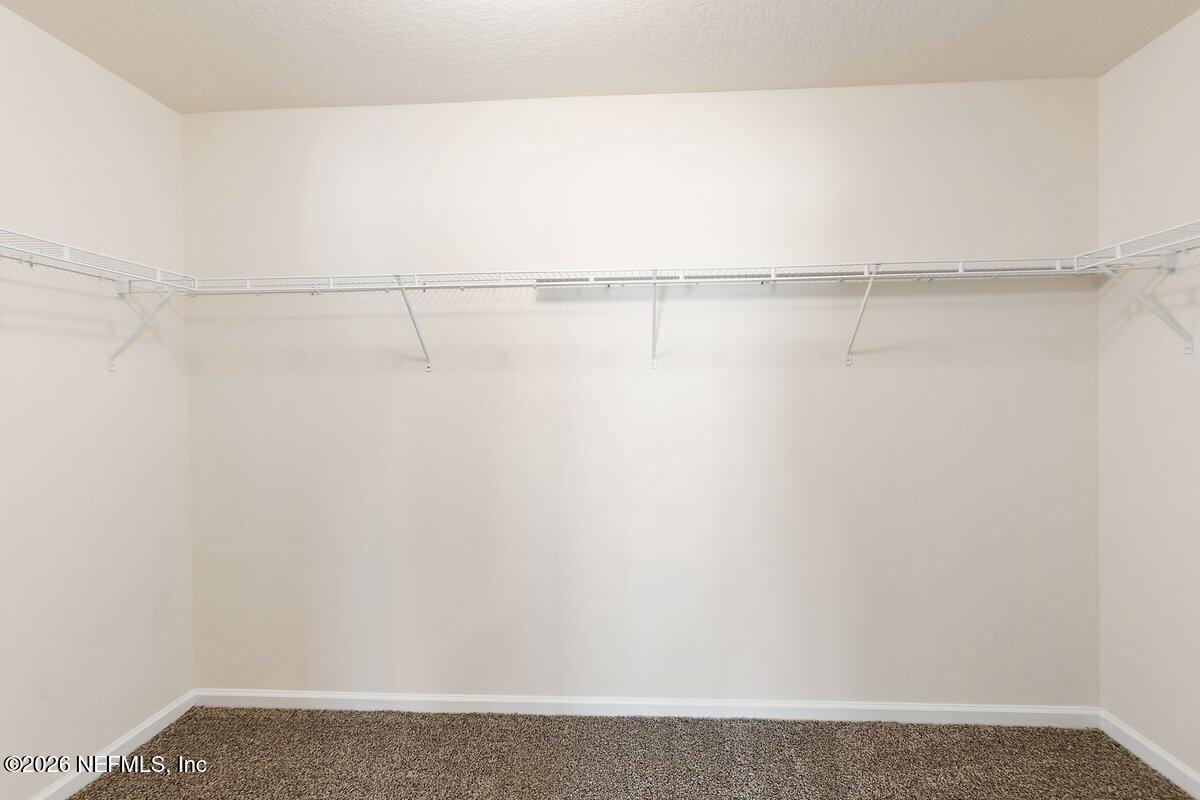 233 Falcon Ridge Road St. Augustine, FL 32084 - Photo 16 of 34 a close up view of racks on the wall