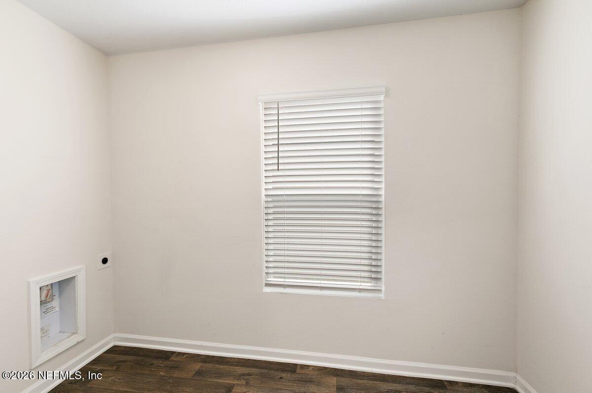 233 Falcon Ridge Road St. Augustine, FL 32084 - Photo 21 of 34 a view of a small space with a window