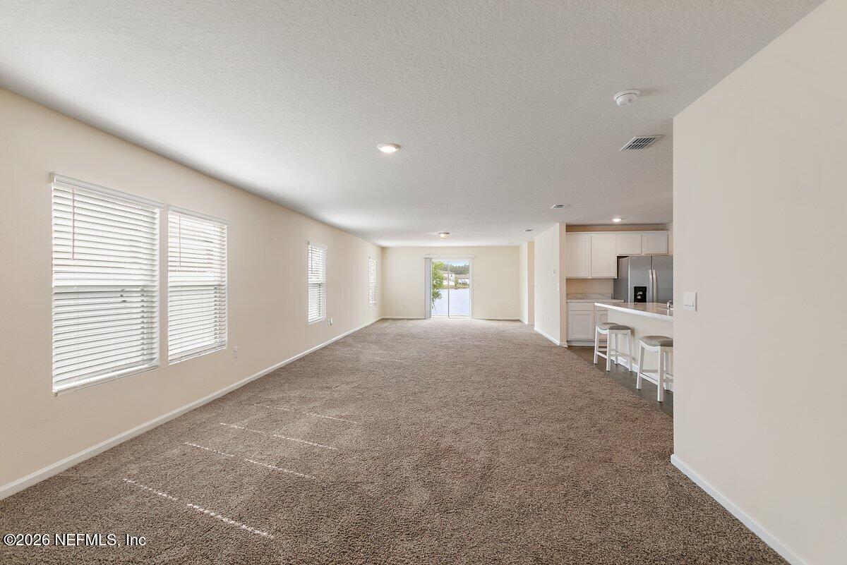233 Falcon Ridge Road St. Augustine, FL 32084 - Photo 5 of 34 a view of kitchen and a window