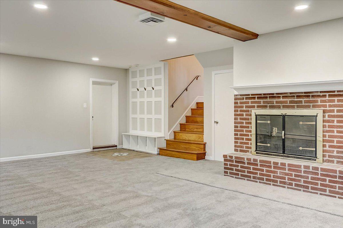 1220 Red Rambler Road Jenkintown, PA 19046 - Photo 46 of 65 Huge Lower Floor Family Room with Fireplace