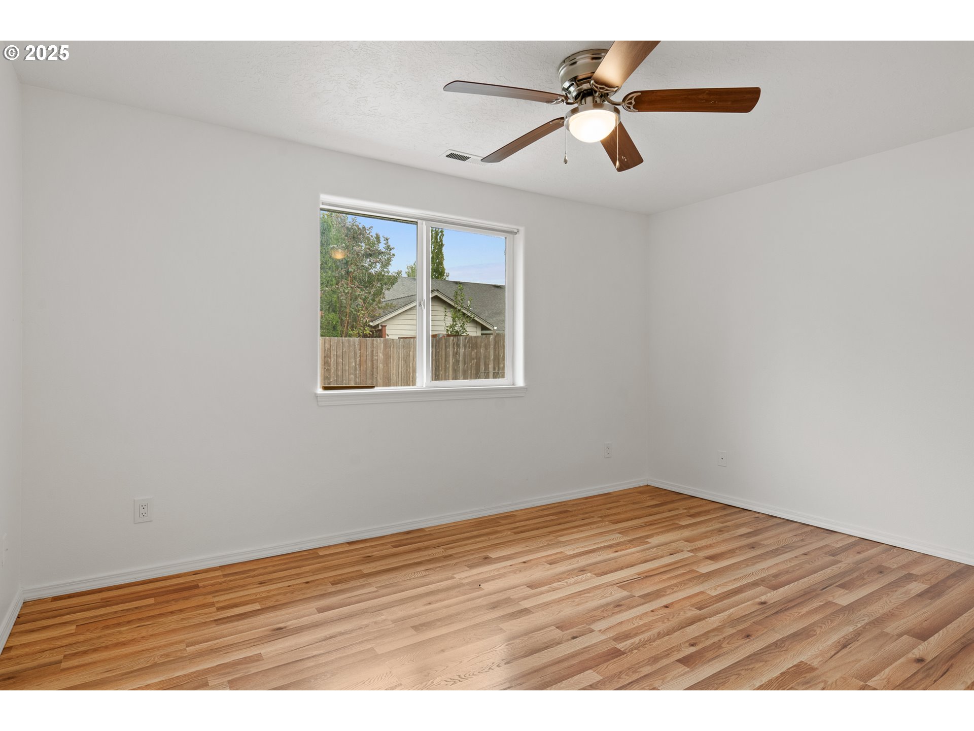 1237 South 7th Street Independence, OR 97351 - Photo 16 of 29 a view of an empty room with a window