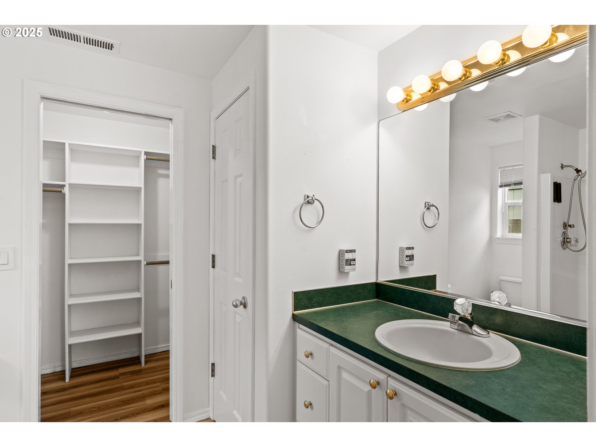 1237 South 7th Street Independence, OR 97351 - Photo 20 of 29 a bathroom with a granite countertop sink and a mirror