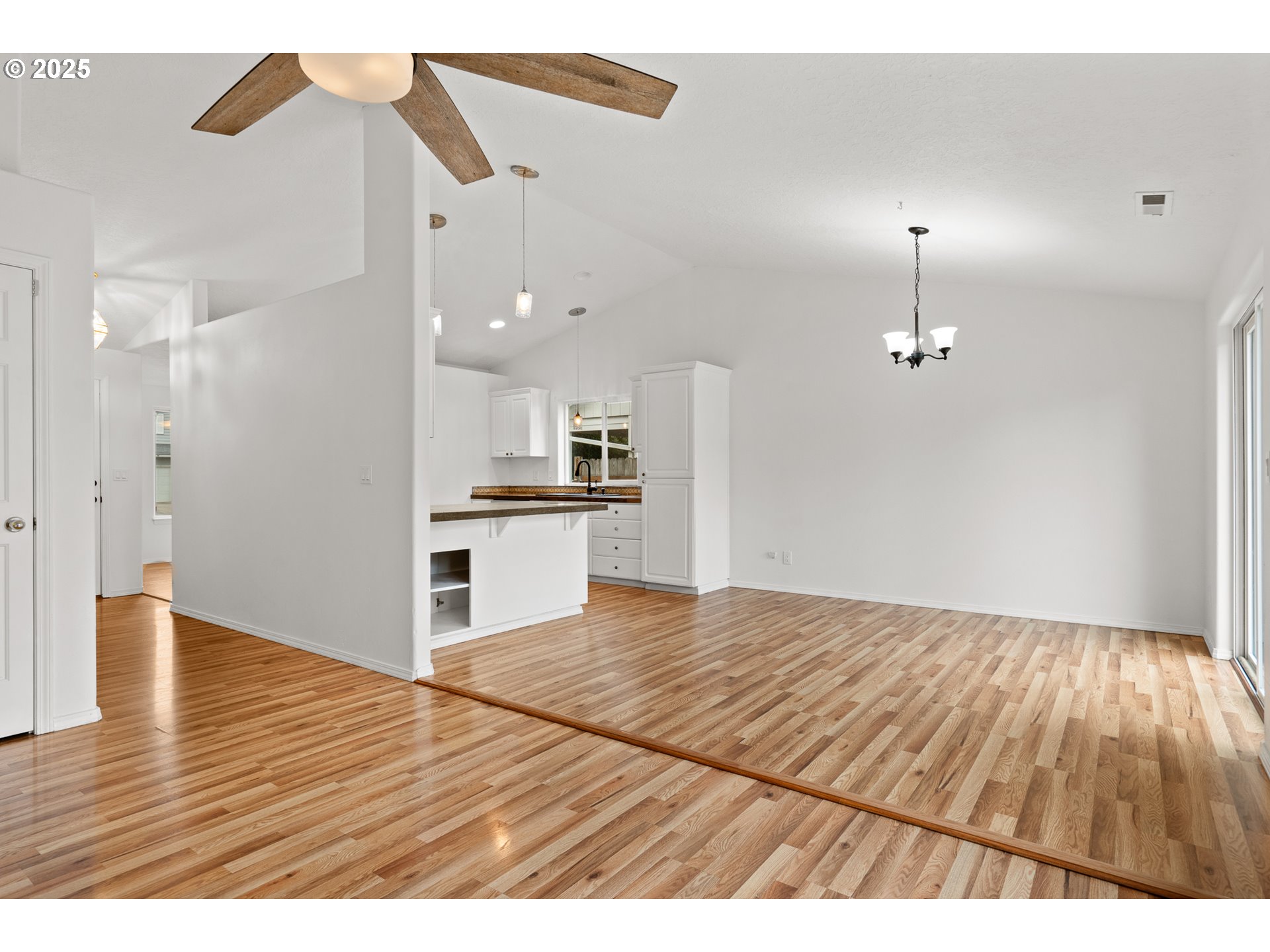 1237 South 7th Street Independence, OR 97351 - Photo 7 of 29 a view interior of kitchen and hall with wooden floor