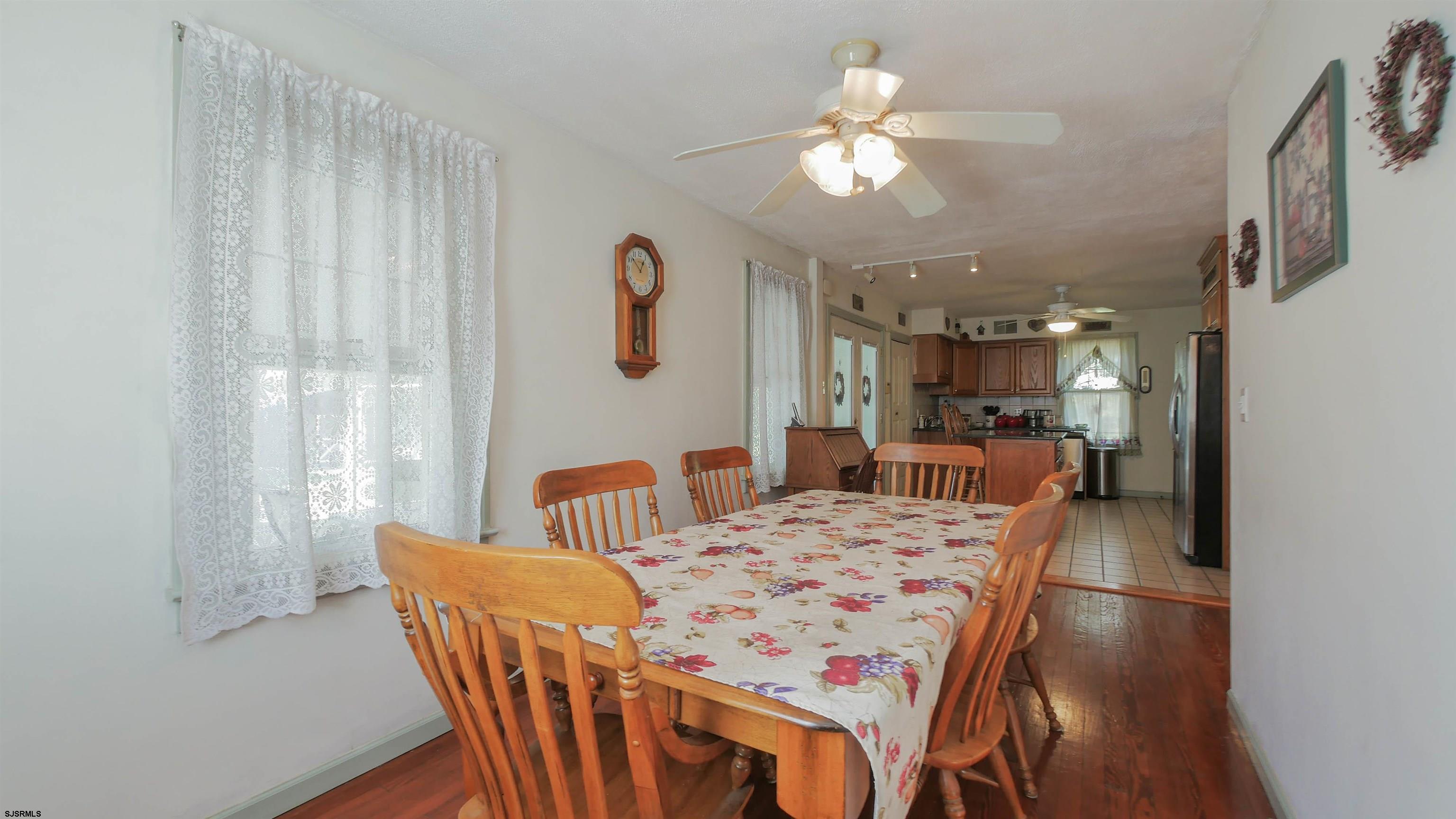 346 Tuckahoe Road Vineland, NJ 08360 - Photo 13 of 44 a view of a dining room with furniture and a chandelier