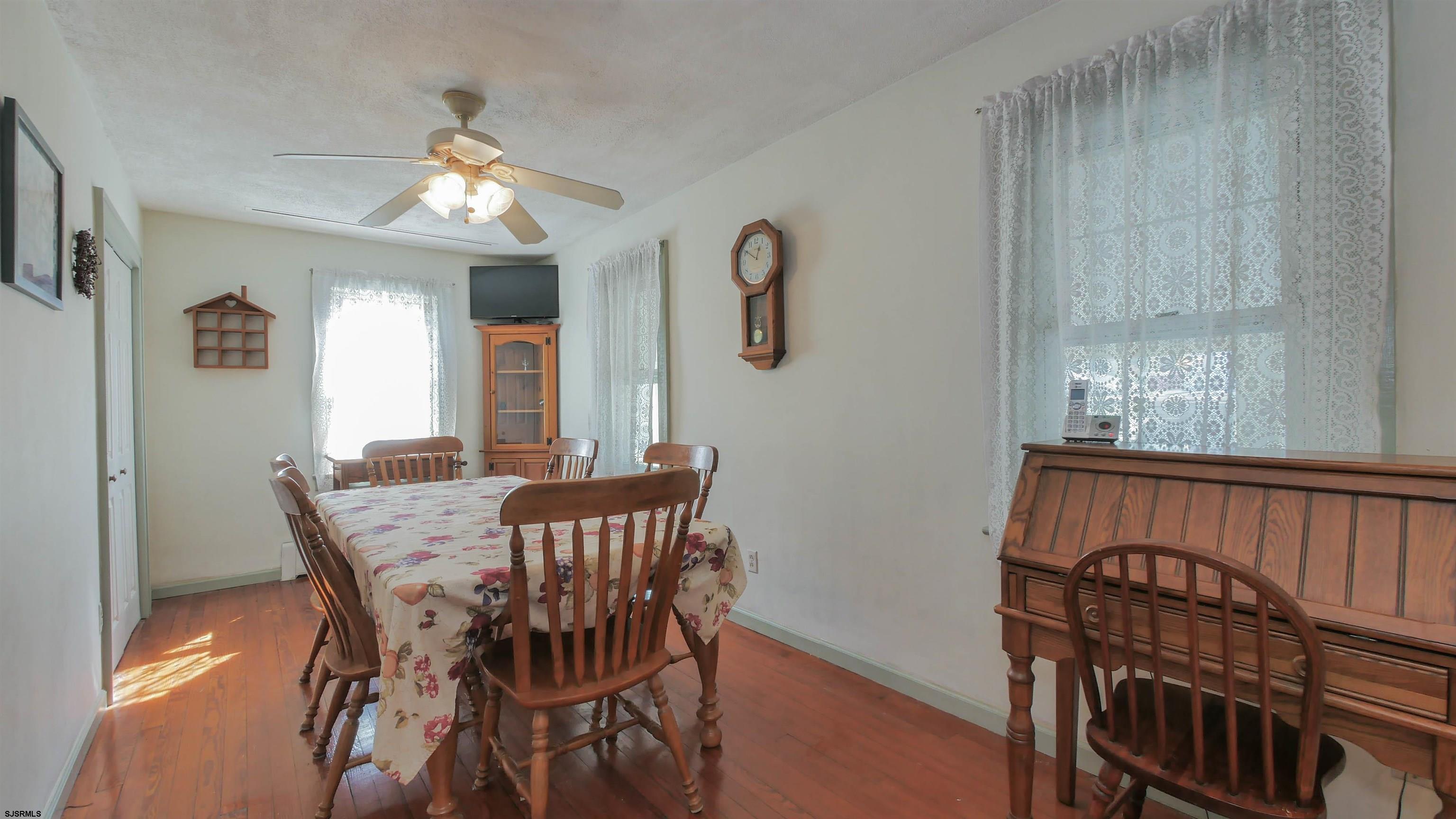 346 Tuckahoe Road Vineland, NJ 08360 - Photo 14 of 44 a view of a dining room with furniture and chandelier