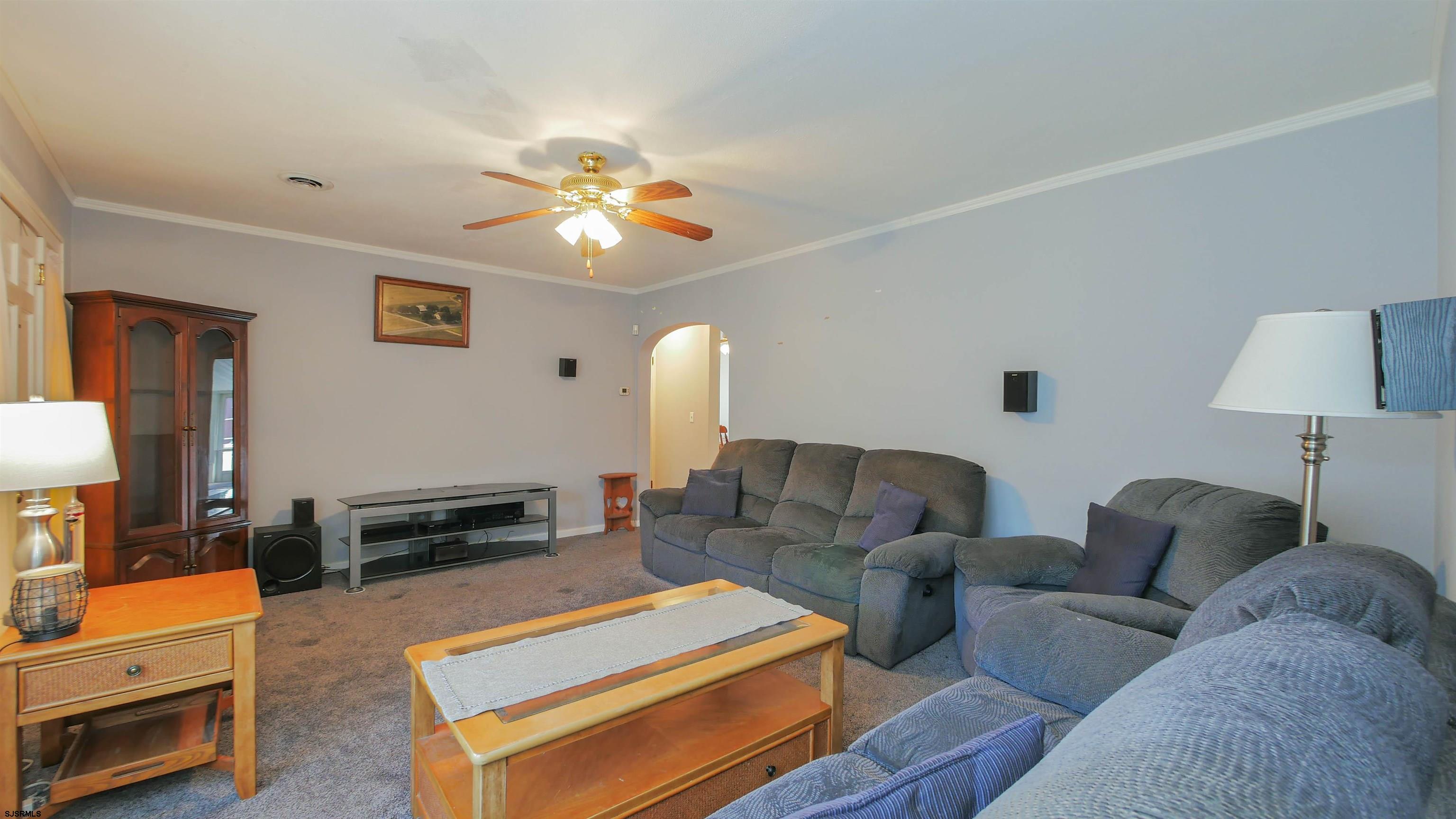 346 Tuckahoe Road Vineland, NJ 08360 - Photo 19 of 44 a living room with furniture and a lamp
