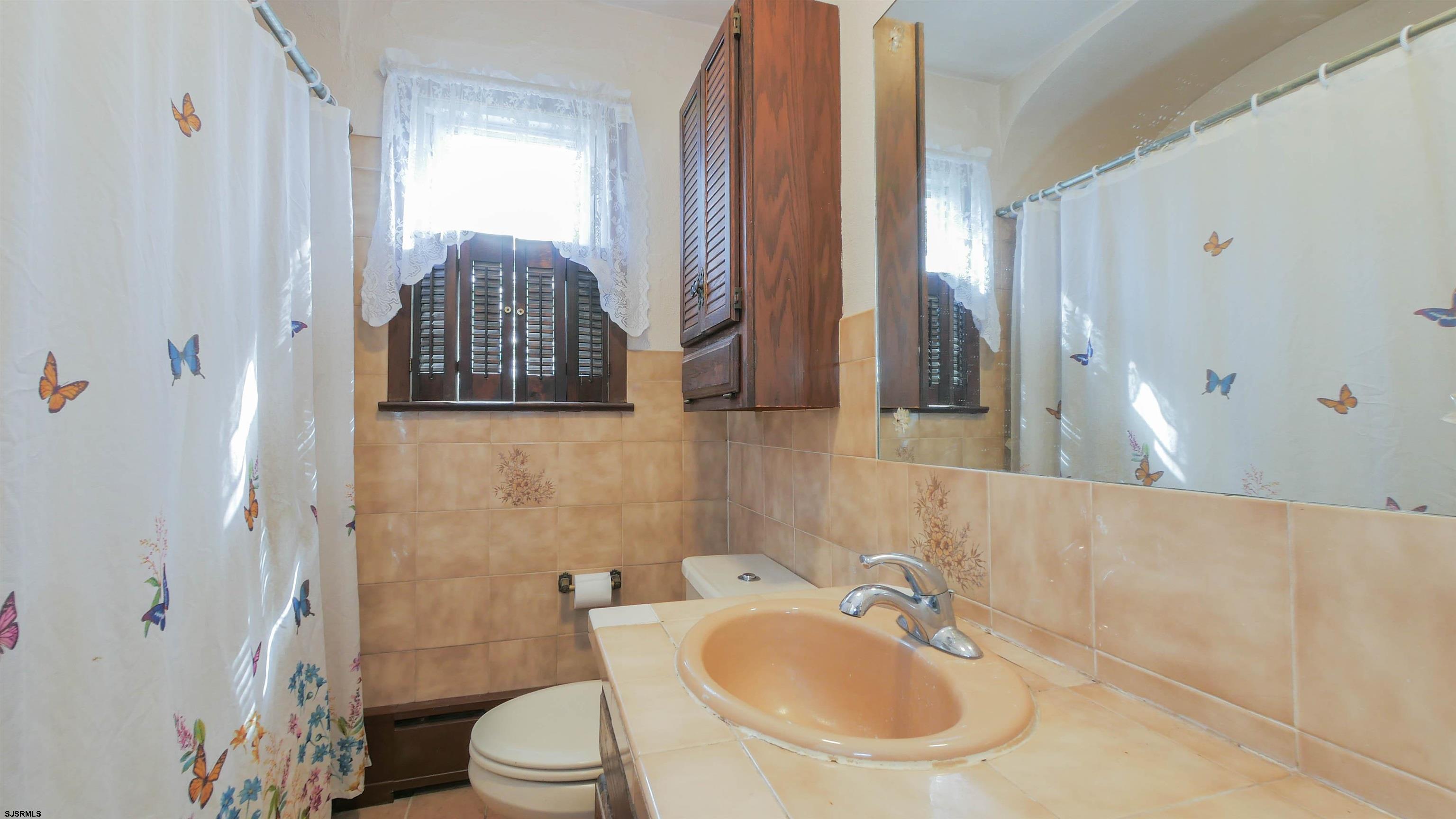 346 Tuckahoe Road Vineland, NJ 08360 - Photo 20 of 44 a bathroom with a sink toilet and shower