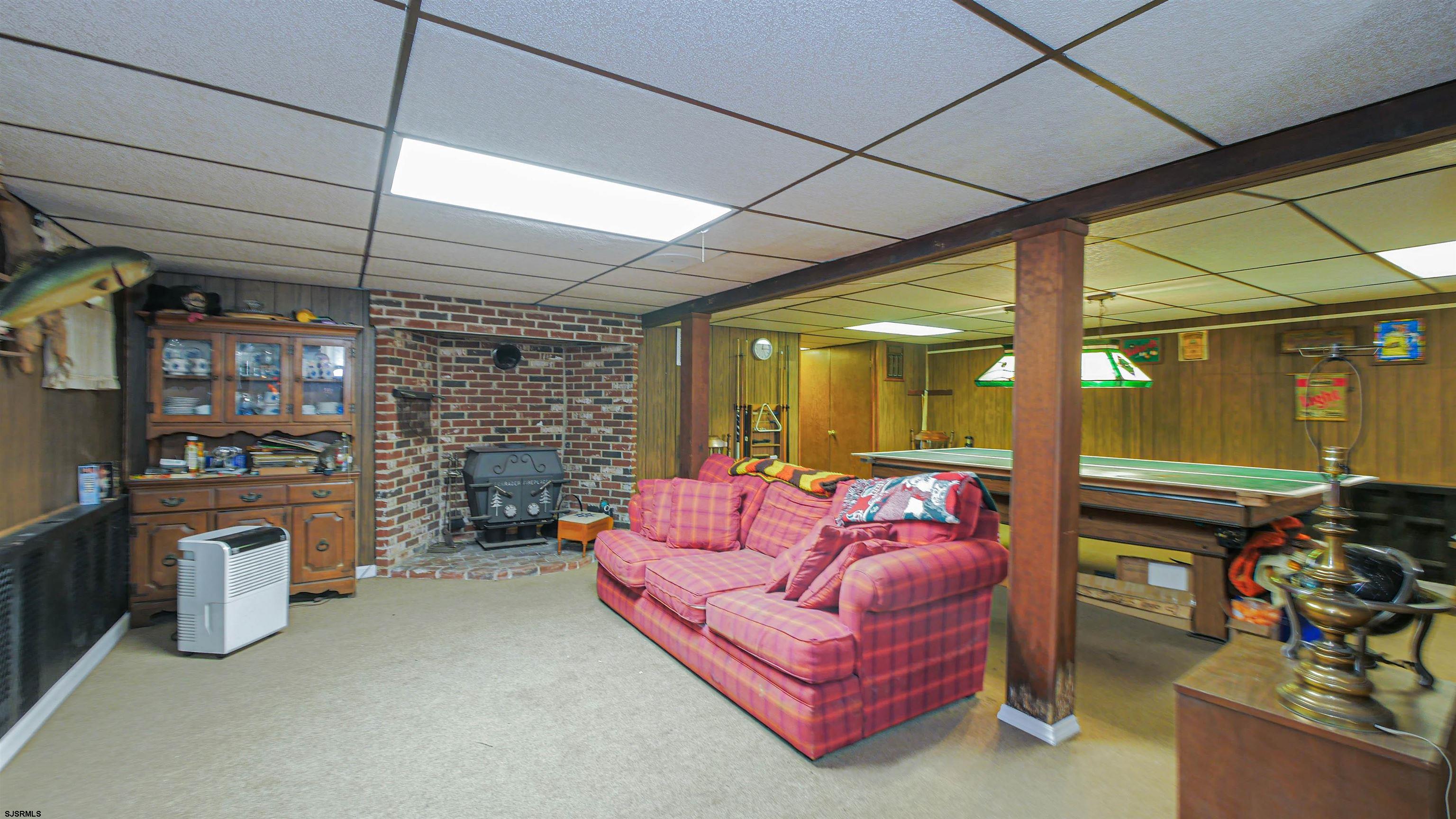 346 Tuckahoe Road Vineland, NJ 08360 - Photo 28 of 44 a outdoor living space with patio furniture and a ceiling fan