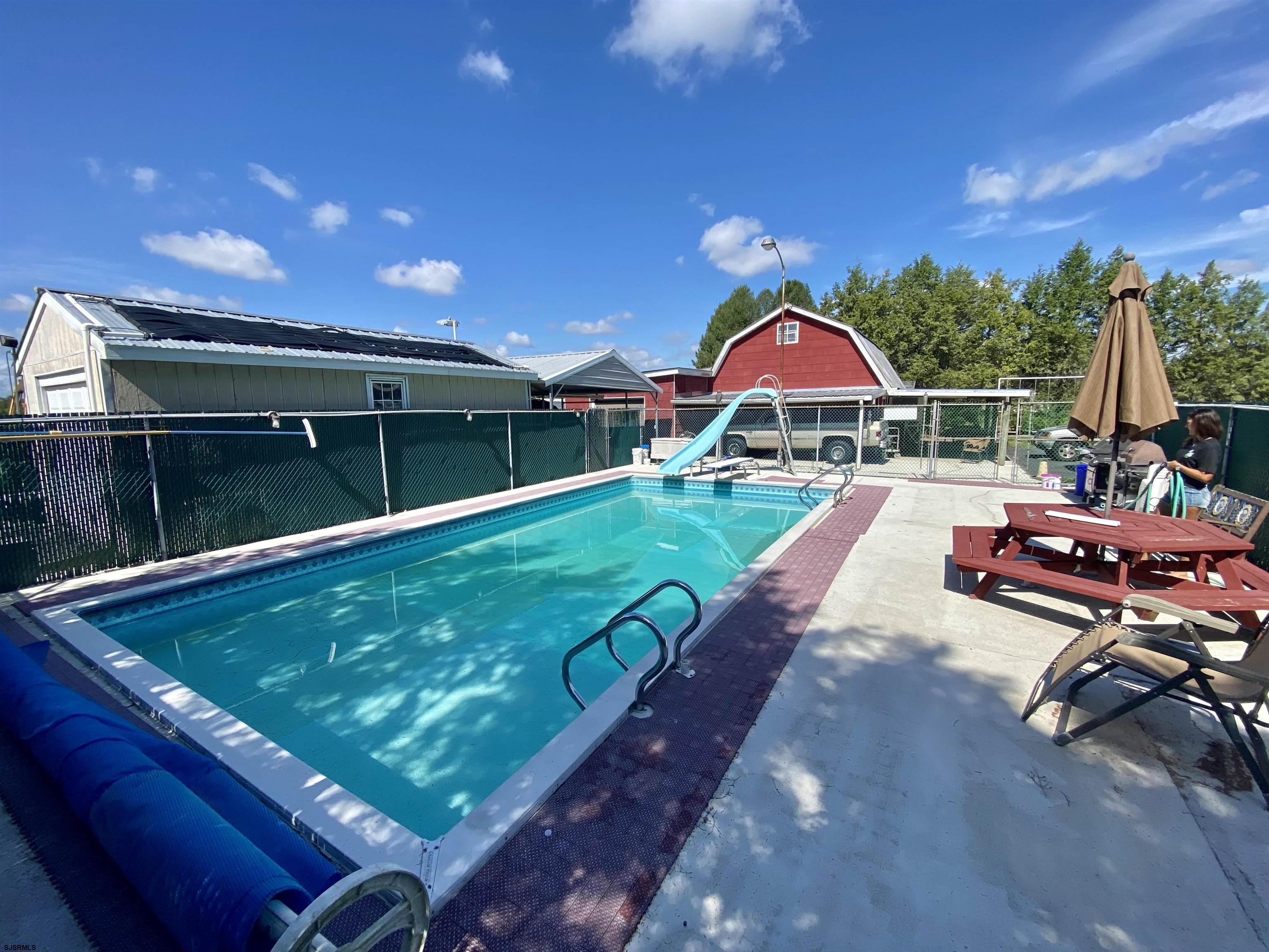 346 Tuckahoe Road Vineland, NJ 08360 - Photo 31 of 44 a view of swimming pool with lounge chair