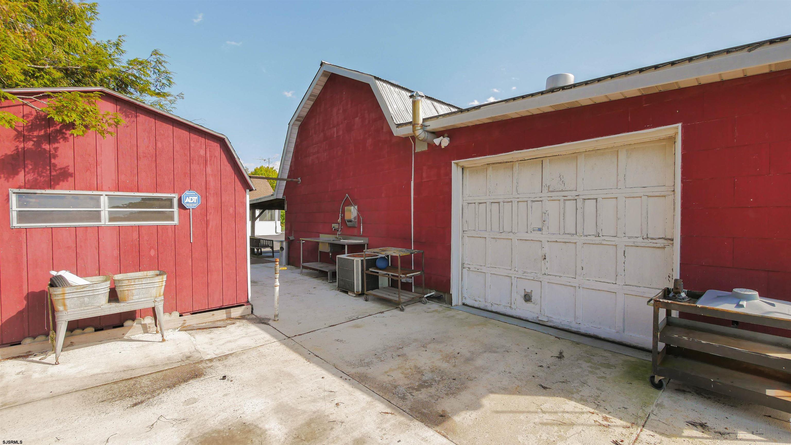 346 Tuckahoe Road Vineland, NJ 08360 - Photo 37 of 44 a view of two chairs in the patio