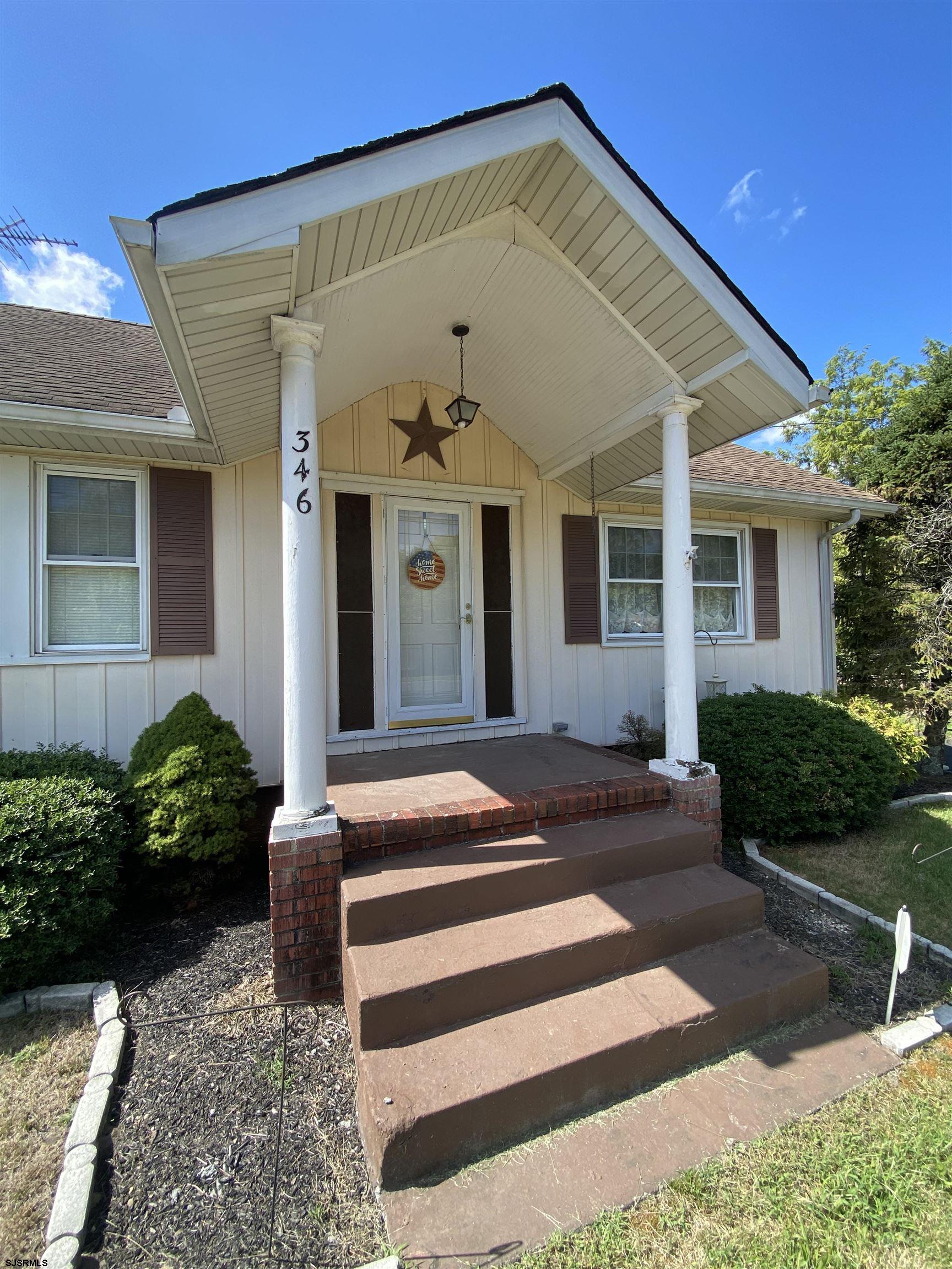 346 Tuckahoe Road Vineland, NJ 08360 - Photo 5 of 44 a view of a house with a yard