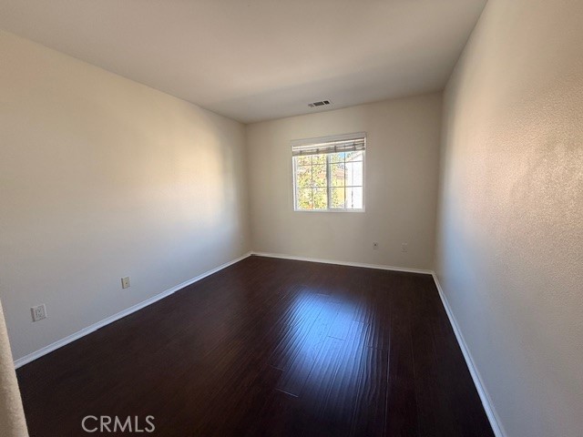 5 Del Mar Irvine, CA 92602 - Photo 11 of 15 an empty room with wooden floor and windows