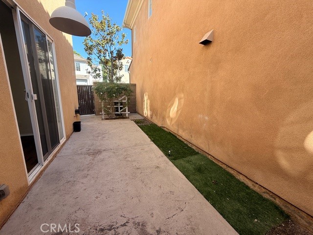 5 Del Mar Irvine, CA 92602 - Photo 15 of 15 a view of a porch with wooden floor and a potted plant