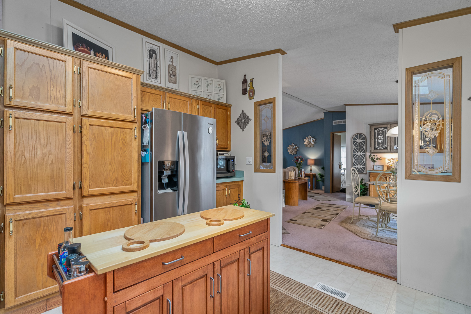 22710 South Ravisloe Lane Frankfort, IL 60423 - Photo 4 of 35 a kitchen with stainless steel appliances granite countertop a refrigerator and a stove top oven