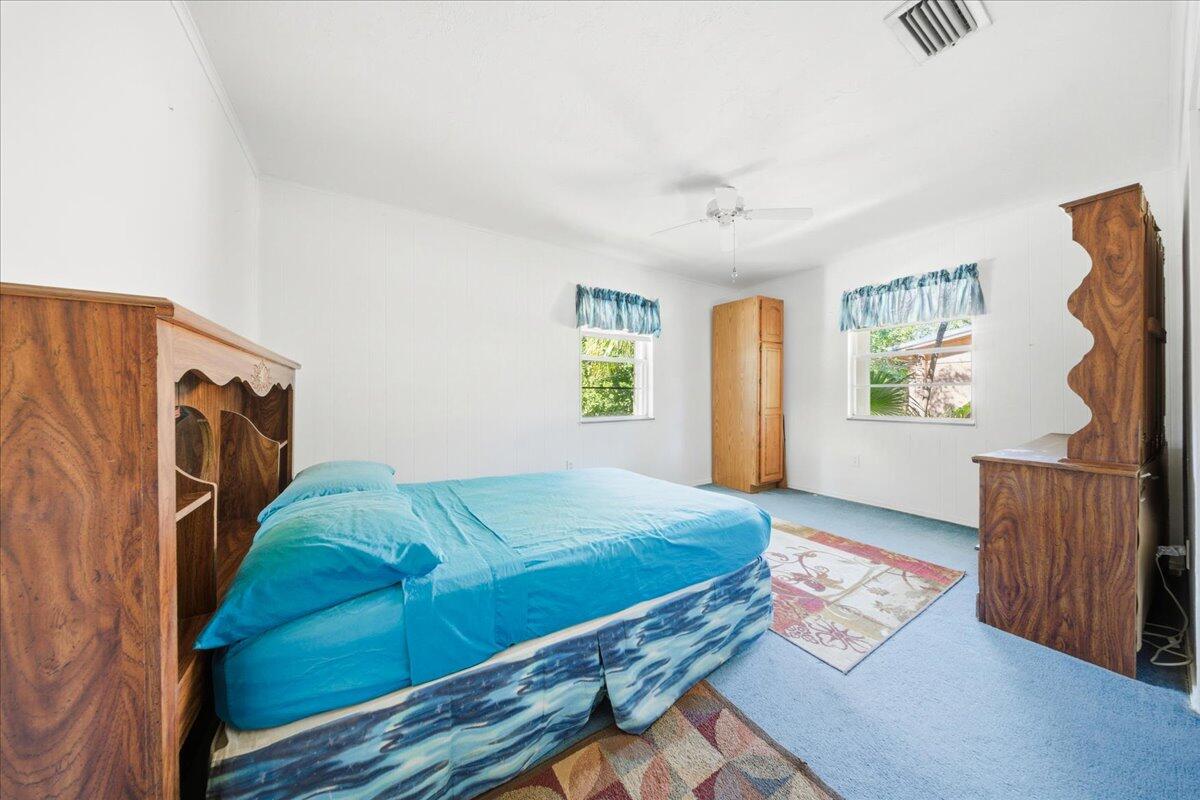 22 Stirrup Key Road Marathon, FL 33050 - Photo 25 of 48 a bedroom with a bed and a window
