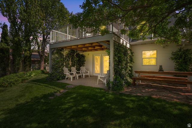 246 West Mount Charm Road Toquerville, UT 84774 - Photo 51 of 70 Rear view of property featuring a patio and a yard