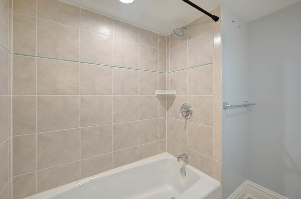 2211 Pioneer Road Evanston, IL 60201 - Photo 18 of 20 a bathroom with a bathtub and shower