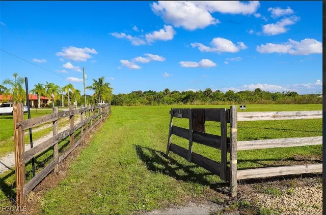 a view of a pathway with a lake view