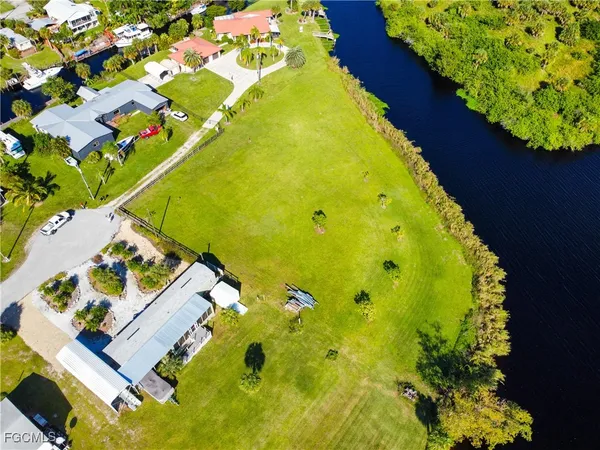 a view of a swimming pool with an outdoor space and seating area