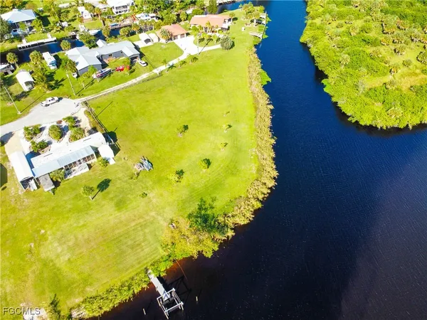 a view of a swimming pool with an outdoor space and seating area