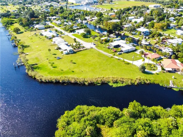a view of a swimming pool a garden and plants