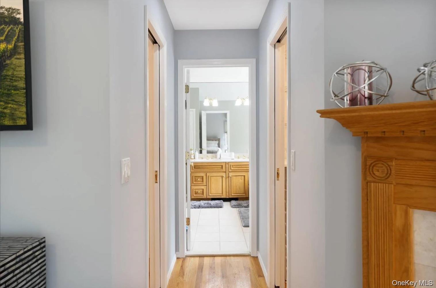 5 Mill Race Road Hampton Bays, NY 11946 - Photo 24 of 34 a view of a hallway with a door and a livingroom